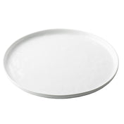 A plain, round white TableCraft Ridge Collection Serving Plate with a slightly raised edge, photographed on a white background. The plate is completely empty and features a smooth, glossy finish.