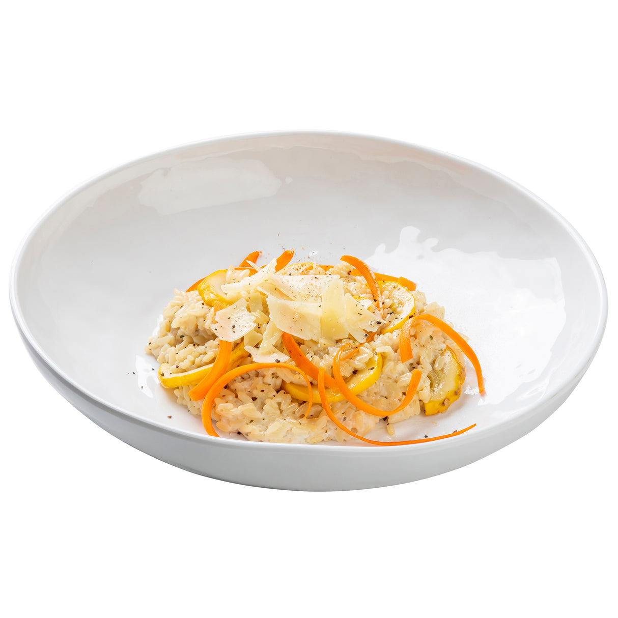 A white Ridge Collection melamine serving bowl holds creamy risotto, topped with thinly sliced yellow squash, carrot ribbons, and shaved parmesan cheese. The dish is garnished with black pepper against a plain white background.