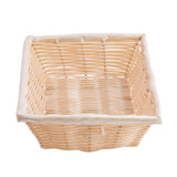 A square, light-colored basket hand-woven from polypropylene cord with a cream fabric lining along the rim and inside, photographed from above on a white background. The basket appears empty and has a simple, woven texture.