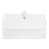 A clear, rectangular glass butter dish with a matching transparent lid and round knob handle on top. The dish, resembling a petite cake cover, is empty and photographed against a plain white background.