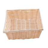 A rectangular, light-colored polypropylene basket with a hand-woven pattern and slightly raised edges, viewed from above on a white background. The basket is empty and has a simple, natural design.