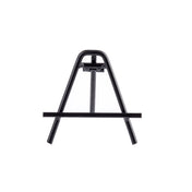 A small, black powder-coated metal easel stands on a white background. This minimalistic card holder easel features an A-frame shape, a horizontal support bar for displaying items, and rubber-tipped feet angled outward for stability. Photographed from the front.