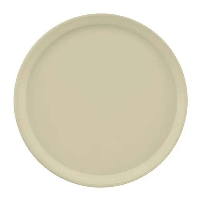 A round, plain, beige Serving Camtray plate with a slightly raised rim, photographed from above against a white background. The fiberglass tray has a smooth, matte finish and is dishwasher safe with no visible patterns or decorations.