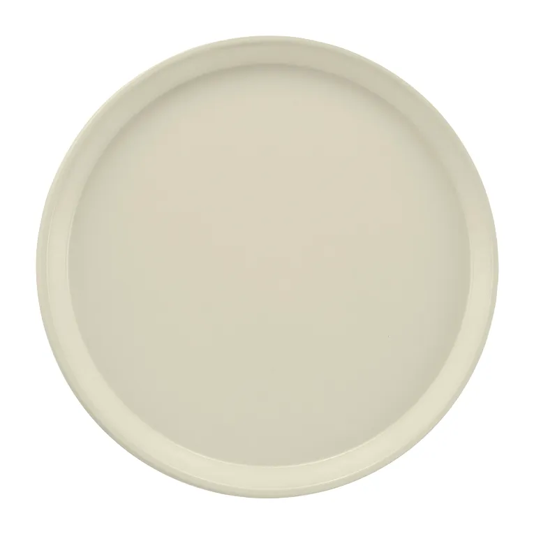 A round, plain, light beige Serving Camtray with a slightly raised rim is shown from a top-down view on a white background. The tray is smooth, unadorned, and evenly colored—and dishwasher safe for easy cleaning.
