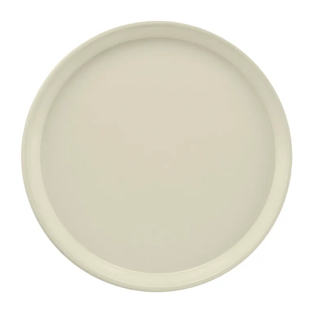 A round, plain, light beige Serving Camtray with a slightly raised rim is shown from a top-down view on a white background. The tray is smooth, unadorned, and evenly colored—and dishwasher safe for easy cleaning.