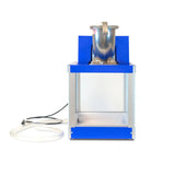 A compact, blue and silver Gold Medal Products Shav-A-Doo machine with a clear front panel, metal container on top, and transparent hose attached to the side. The simple, functional Sno pan design features minimal visible controls against a white background.