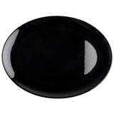 A glossy, oval-shaped melamine Serving Platter from the Sierra Collection is shown against a white background. Reflections on its surface highlight the modern, minimalist design and smooth, shiny finish. The plate is empty and photographed from above.