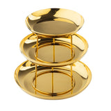 A shiny, gold-finish, three-tiered serving tray with round plates supported by thin metal bars. Perfect as a seafood tower, the trays decrease in size from bottom to top and feature a reflective surface against a white background.