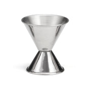 A stainless steel jigger with a double-sided, hourglass shape and clear capacity stamping. One side is larger for measuring different liquor amounts. The jigger's shiny, reflective surface appears against a plain white background.