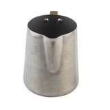 A silver stainless steel frothing cup with a matte finish, wide body, and narrow base. It features a small spout at the rim for pouring, and two visible rivets attach the handle on the back, set against a plain white background.