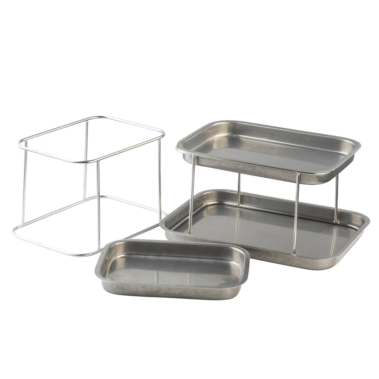 Three rectangular stainless steel trays and two metal wire racks form a 3-tier Sharing Tower. One rack elevates a tray for a tiered layout, while the other stands empty. The trays feature a simple design with rounded edges.