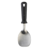 A metal PerfectGrip Ice Cream Spade with a wide, rounded stainless steel head and a black ergonomic handle featuring textured grip lines and a hanging hole. The scoop is photographed against a white background. NSF certified for quality.