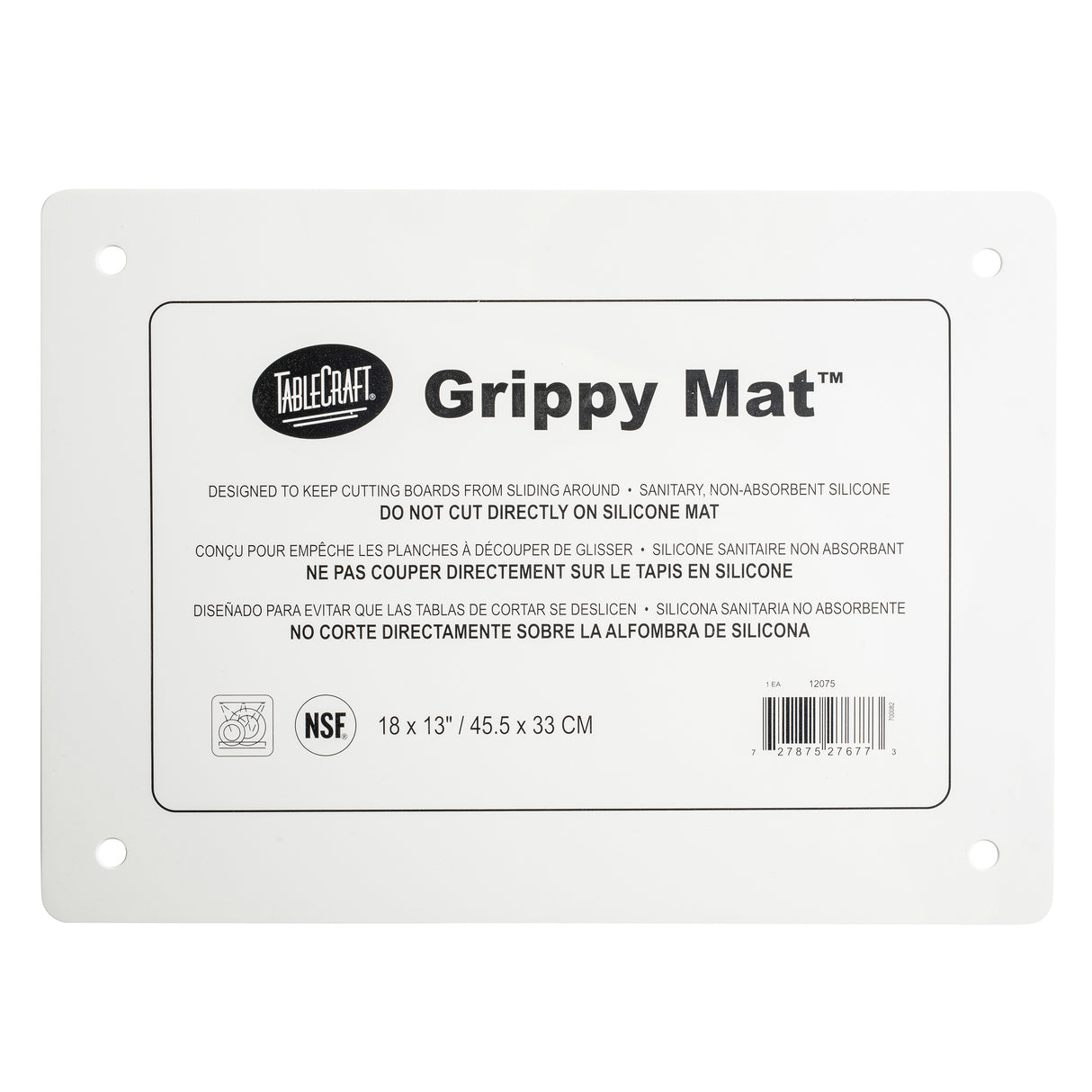 A rectangular white Grippy Mat Cutting Board by TableCraft. This anti-slip cutting mat features rounded corners, four corner holes, and a multilingual label with use and care instructions. Size: 18x13 in (45.5x33 cm).