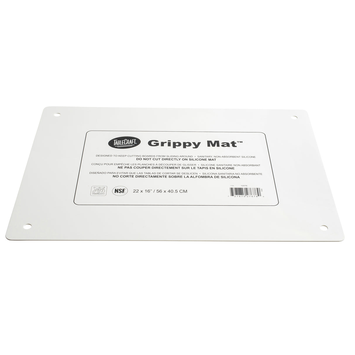 A rectangular white silicone imprinted cutting board mat labeled “Grippy Mat” lies flat. It features anti-slip properties, rounded corners, a hole in each corner, and a central label with product info and measurements: 22 x 16 in / 55 x 40.5 cm.