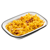A rectangular white melamine serving pan from the TableCraft Products Canteen Collection is filled with baked macaroni and cheese. The creamy, yellow cheese sauce has crispy browned spots on top, and the dish sits against a white background.
