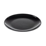 A round, shiny, black melamine serving platter sits on a white background. The platter is empty and has smooth edges, with a slight reflection visible on its glossy surface.