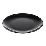 A simple, round, glossy black melamine plate from the Sierra Collection is shown on a white background. The plate has smooth edges and a shallow depth, reflecting light on its surface and highlighting its minimalist design.