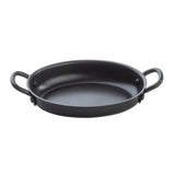 A black, shallow, round Mini Serving Fry Pan with two sturdy handles on either side. This TableCraft Products pan features a smooth, matte finish and non-stick surface, displayed empty against a plain white background.