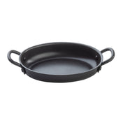 A black, shallow, round Mini Serving Fry Pan with two sturdy handles on either side. This TableCraft Products pan features a smooth, matte finish and non-stick surface, displayed empty against a plain white background.
