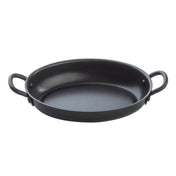 A black, oval-shaped TableCraft roasting pan with a non-stick coating and two sturdy handles sits on a plain white background. The smooth, shallow interior makes it ideal for baking or roasting, while the outward-curved handles offer easy gripping.