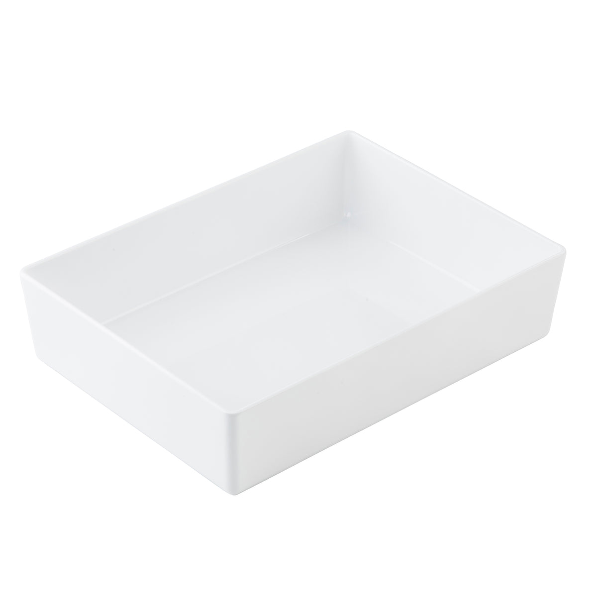A plain, rectangular white ceramic dish with smooth sides and slightly rounded corners, viewed at an angle from above against a white background. This clean, minimalist half size bowl is ideal for serving and fits seamlessly with TableCraft Products.