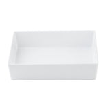 A plain, rectangular white ceramic dish with straight sides and smooth edges is shown against a white background. Similar to a half size bowl by TableCraft Products, the dish is empty and has a glossy finish.