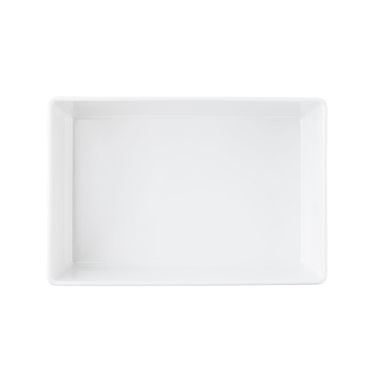 A plain, rectangular white ceramic plate is shown on a white background. With smooth, slightly raised edges and no visible patterns, it offers a clean, minimalist look—perfect for pairing with a TableCraft Products melamine bowl for modern table settings.
