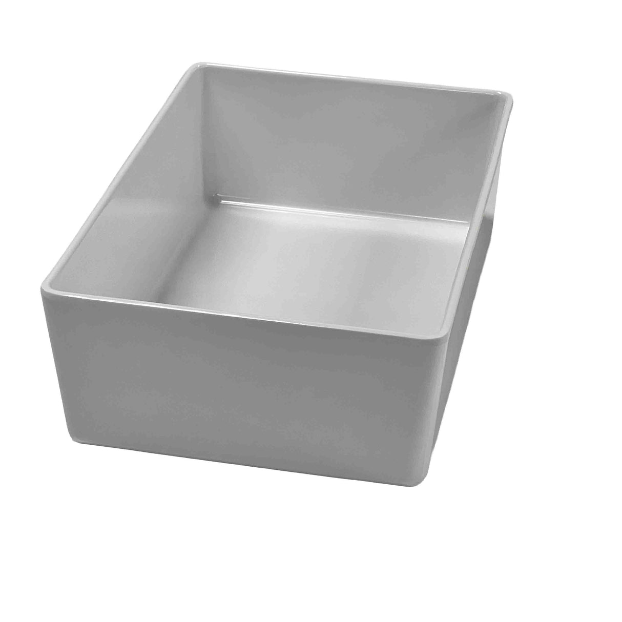 A plain, rectangular, white ceramic container with straight sides and rounded corners, shown from a slightly elevated angle on a white background. Resembling the Simple Solutions Bowl, this empty dish has a glossy finish.