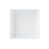 A plain, empty white sixth size bowl is photographed from above, centered on a white background. The clean, smooth surface and straight edges of the dish make it look modern and minimalistic.
