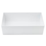 A rectangular, white ceramic sink with straight edges and smooth surfaces, shown against a plain white background. The deep, unadorned design offers a modern look reminiscent of the Simple Solutions Bowl by TableCraft.