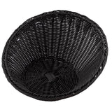 A round polypropylene basket, like the TableCraft 12129, is shown from an overhead angle. This handwoven basket features tightly woven strands, a patterned base, a reinforced rim, and small gaps between its smooth interior strands.