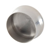 A shiny, round stainless steel bowl is shown tilted sideways, with the inner surface and circular base visible. Its smooth, reflective metal surfaces resemble a cocktail shaker replacement cap. The background is plain white.