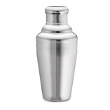 A shiny, stainless steel cocktail shaker stands upright against a plain white background. Part of a premium bar shaker set, it has a smooth, reflective surface and classic tapered design with a rounded cap—and it's dishwasher safe for easy cleanup.