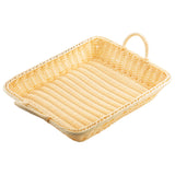 A rectangular, light beige handwoven basket with two looped handles at opposite ends. The basket’s sides and base feature a tight, uniform weave pattern, and it is empty, displayed against a plain white background.
