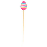 A wooden toothpick with a decorative pink Easter egg topper, featuring horizontal stripes and polka dots. The egg sits atop the stick, which tapers to a point—perfect as Decorative Picks or festive TableCraft Products for any spring event.
