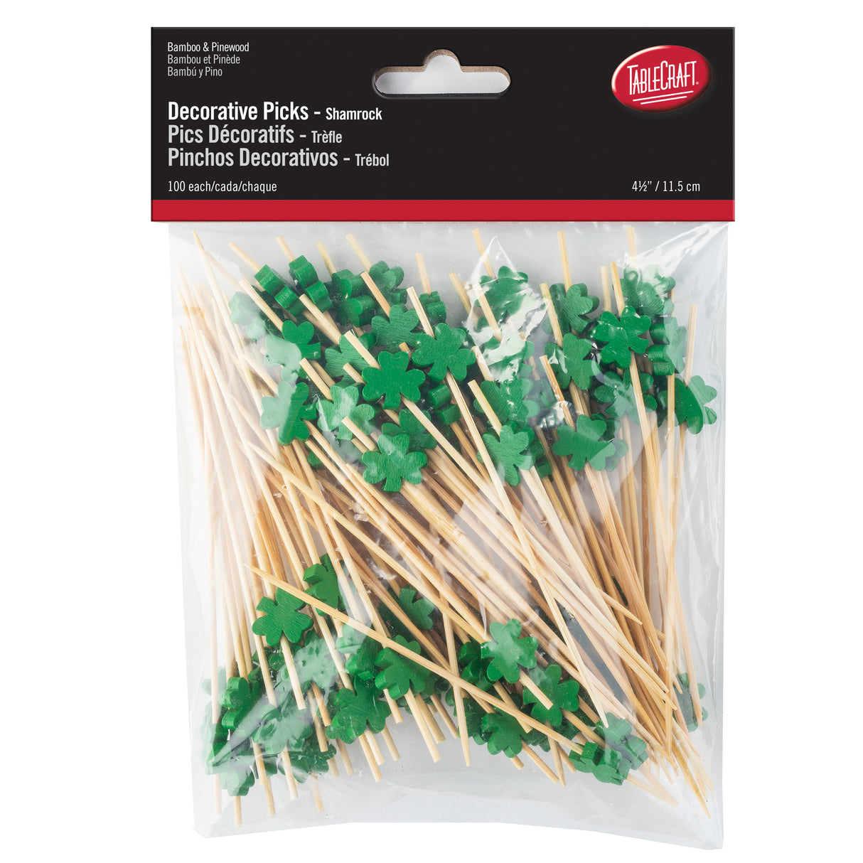 A clear plastic bag contains 100 bamboo picks, each topped with a green shamrock shape. The package label reads Decorative Picks – Shamrock and includes the TableCraft logo. The picks are 4.5 inches (11.5 cm) long.