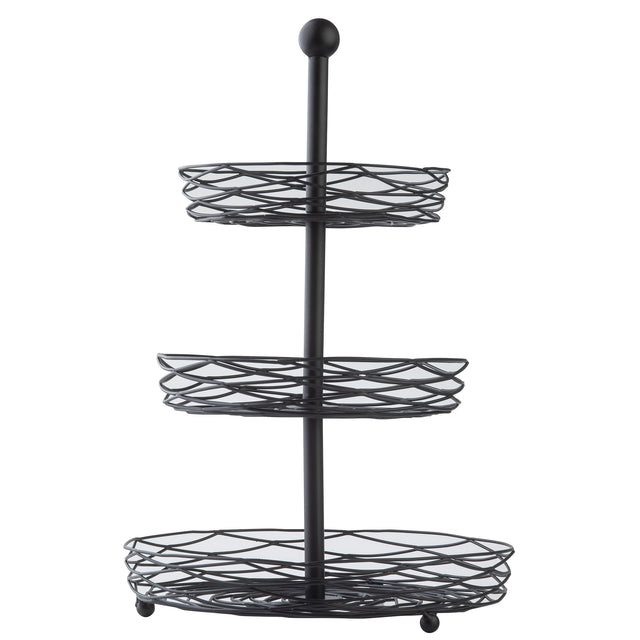 A black powder coated steel, three-tier display basket from the Artisan Collection features circular baskets of increasing size, supported by a central rod with a round knob. The open design ensures easy visibility and access to stored items.