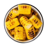 A white melamine bowl filled with several pieces of grilled corn on the cob, each showing char marks. The bright yellow segments have a slightly glossy texture, and the TableCraft bowl is set against a plain white background.