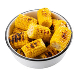 A white TableCraft melamine serving bowl with a black rim is filled with several pieces of grilled corn on the cob, each piece showing golden-yellow kernels and visible char marks, all photographed on a white background.