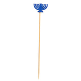 A wooden skewer from TableCraft Products with a blue menorah decoration made of paper or plastic at the top. This decorative pick features a stylized nine-branch menorah, symbolizing Hanukkah, set against a plain white background.