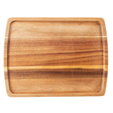 A rectangular Acacia board with rounded corners and a recessed groove around the edge. The board displays natural wood grain patterns in various brown shades, and it is set against a plain white background.