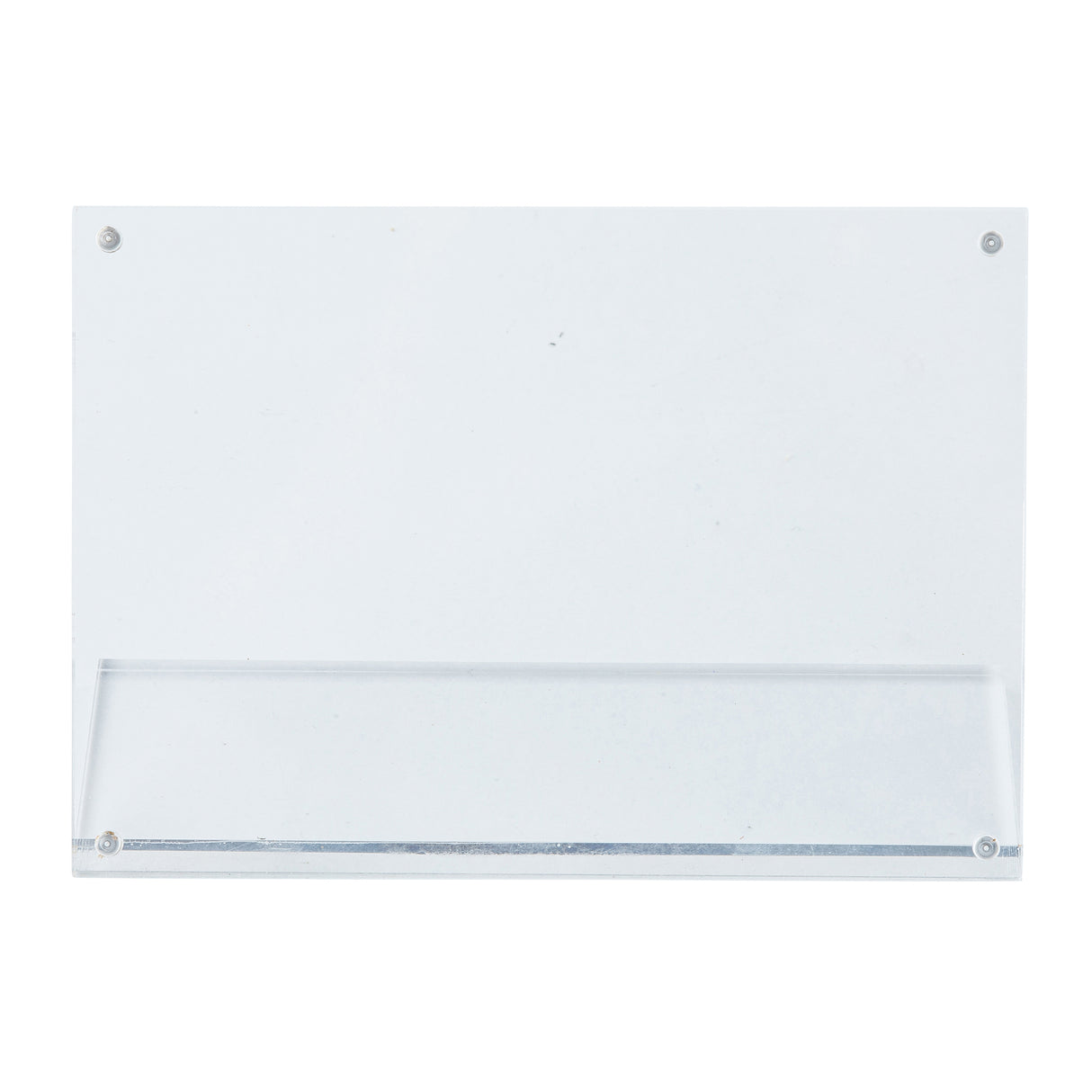 A clear, rectangular Acrylic Sign Holder by TableCraft Products, wall-mounted with four corner screw holes. It features a bottom slot for easy sign insertion and is photographed against a plain white background.