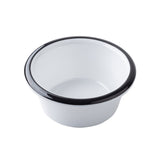 A white, round TableCraft enamel bowl with a black rim sits on a white background. The glossy, melamine-like finish and classic design give it the clean simplicity of a timeless ramekin, highlighted by bright lighting.