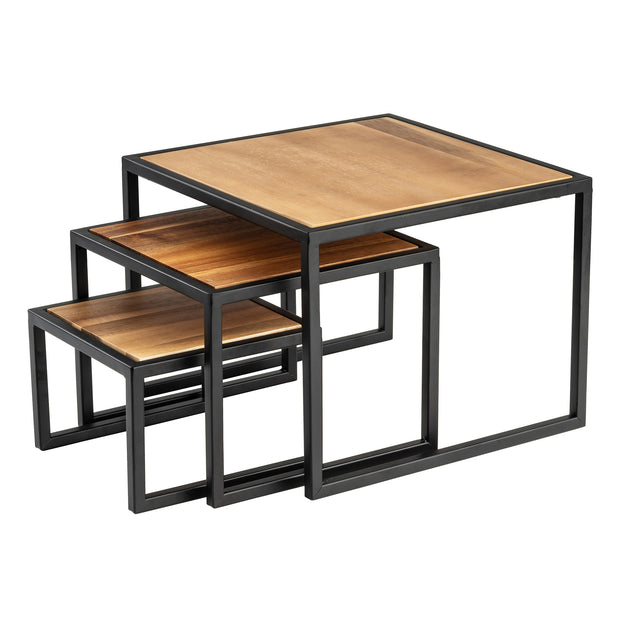 Three wooden nesting tables with square powder coated steel frames are stacked together. Each table features an acacia wood top with a natural finish, and the tables fit neatly underneath one another, showcasing a modern, minimalist design.