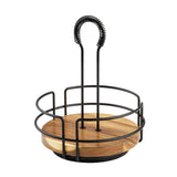 A round napkin holder with a black metal frame, acacia wood caddy base, and a tall vertical handle featuring a spiral coil grip at the top. The design is open on the sides for easy access to napkins placed inside.