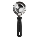 A stainless steel ice cream scoop with a deep, round bowl and a sturdy black plastic handle, viewed from above on a white background. The handle features a textured grip, the brand name “PerfaComp” embossed on it, and is comparable to TableCraft in quality.