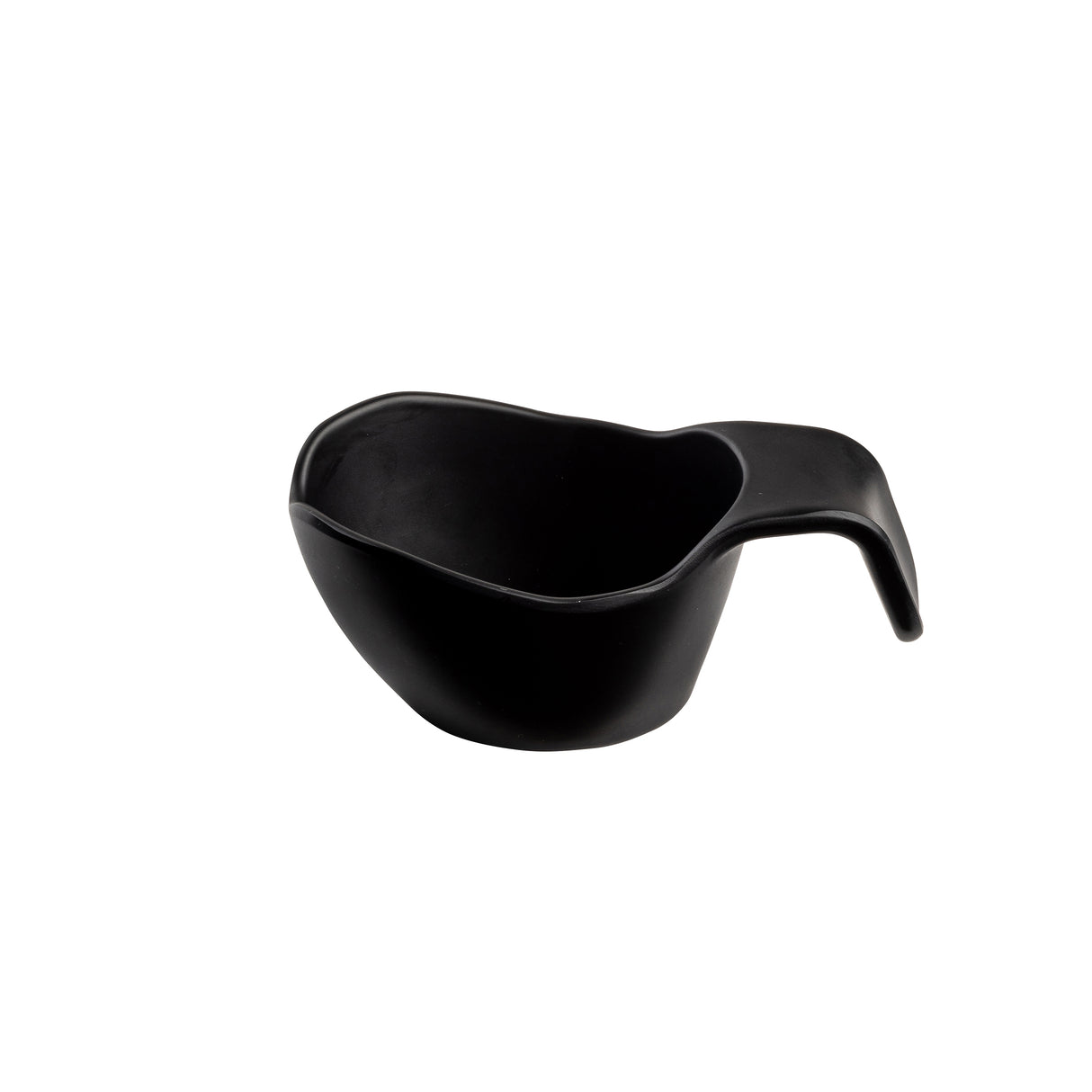 A black ceramic cup with an asymmetrical, organic shape and a wide, curved handle sits on a white background. Its modern, minimalist design and smooth surface make it versatile enough to use as a unique sauce boat.