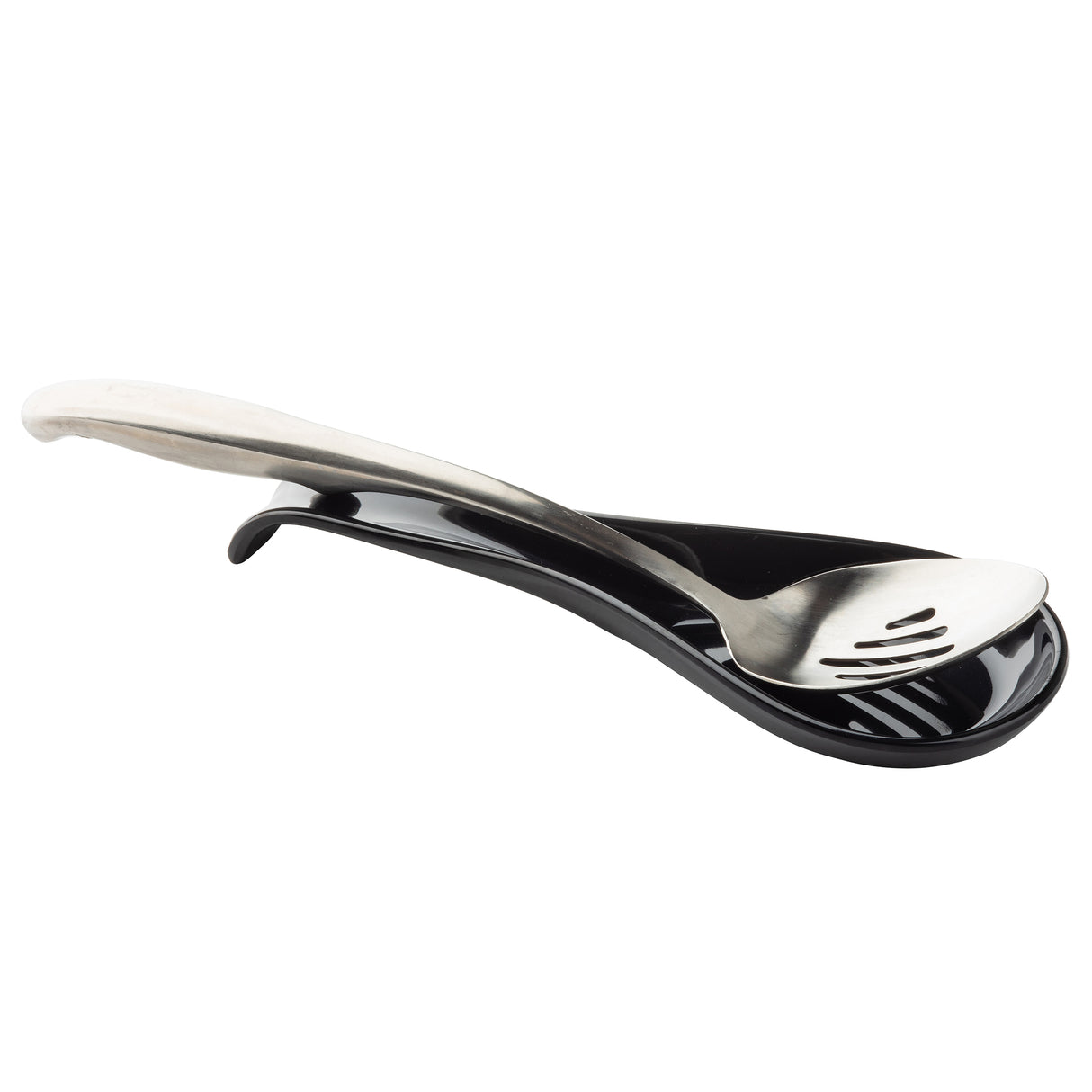 A stainless steel slotted spoon rests on a glossy black TableCraft spoon rest. The curved, elongated melamine holder is designed to catch drips from the spoon, whose handle extends over the edge while its bowl features three slots for draining.