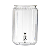 A large, clear 2-gallon beverage dispenser with vertical ribbed lines, a wide opening at the top, and a shiny silver spigot at the bottom front for pouring drinks. The acrylic dispenser is empty and shown against a white background.