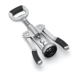 The TableCraft Premium Winged Corkscrew, shown in sleek silver and black metal, features two lever arms, a central corkscrew spiral, wide circular base, and a large handle for twisting. Hand wash only to maintain its quality.